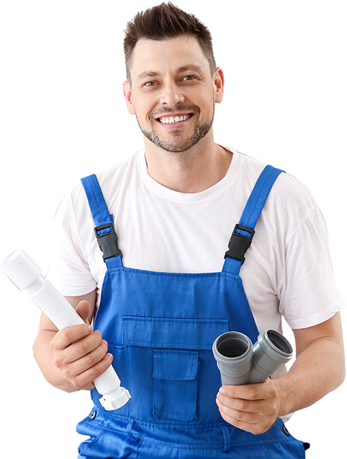 Plumber holding plumbing pipes